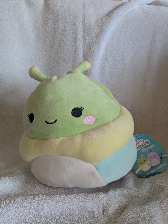 Squishmallows Other - Squishmallows Pastel Green Snail Plush with Yellow, Blue, and Cream Layers